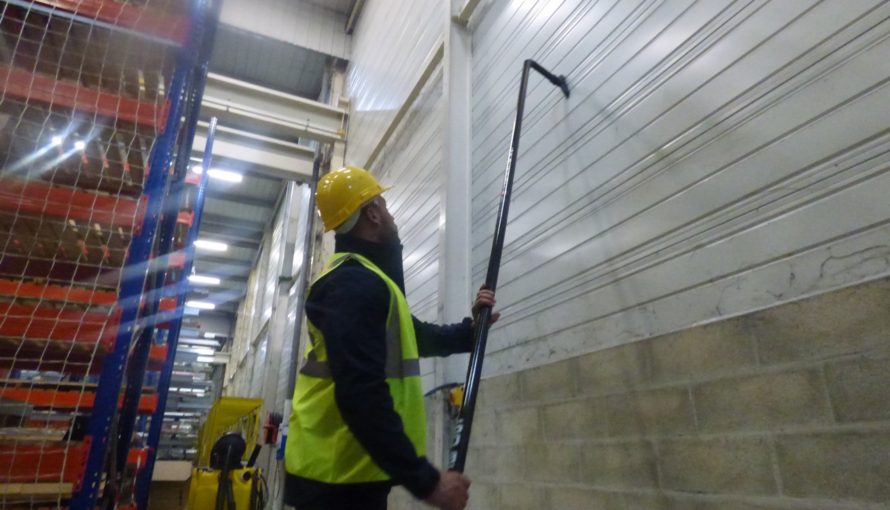 SpaceVac Industrial cleaning in a warehouse wall