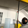 cleaning the high reach areas with spacevac system