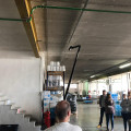 Man using Spacevac cleaning tool to clean the high level areas in the warehouse