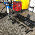 SpaceVac high level vacuum cleaning systems lay on the floor