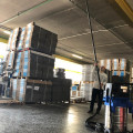 Man cleaning warehouse with SpaceVac high level vacuum cleaning equipment-2